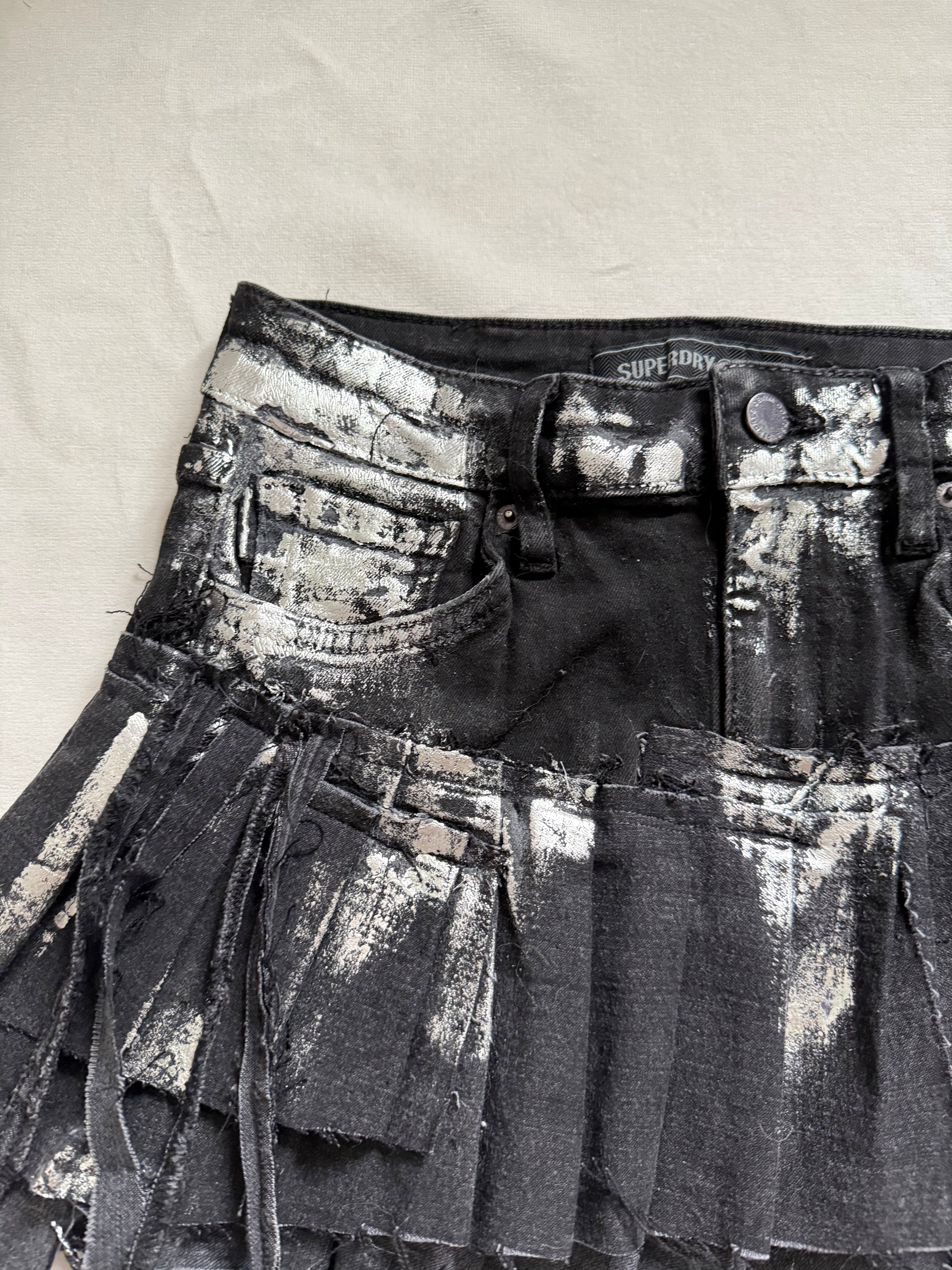 Asymmetrical silver foil pleated mini skirt
