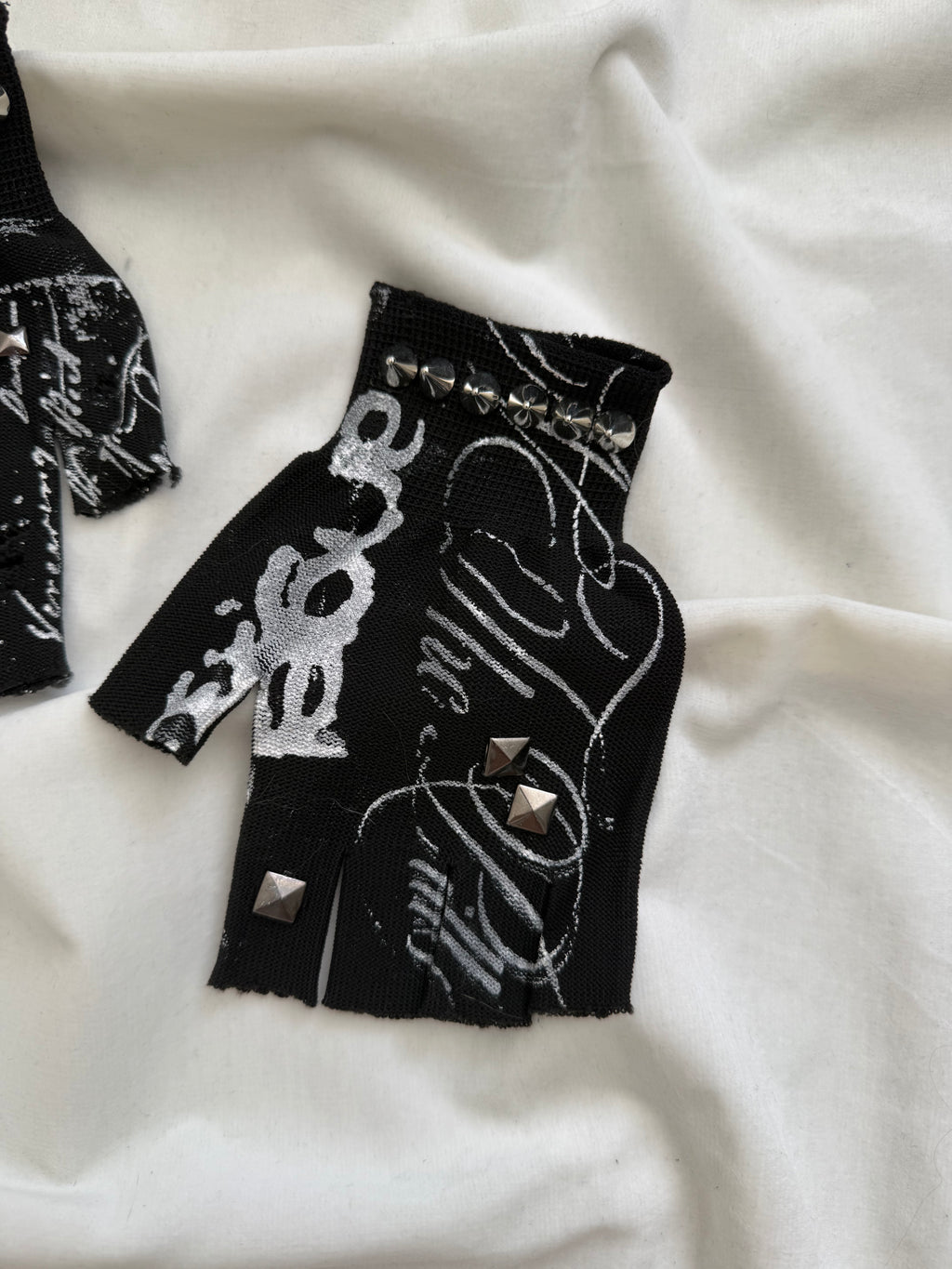 black and white graphic distressed gloves