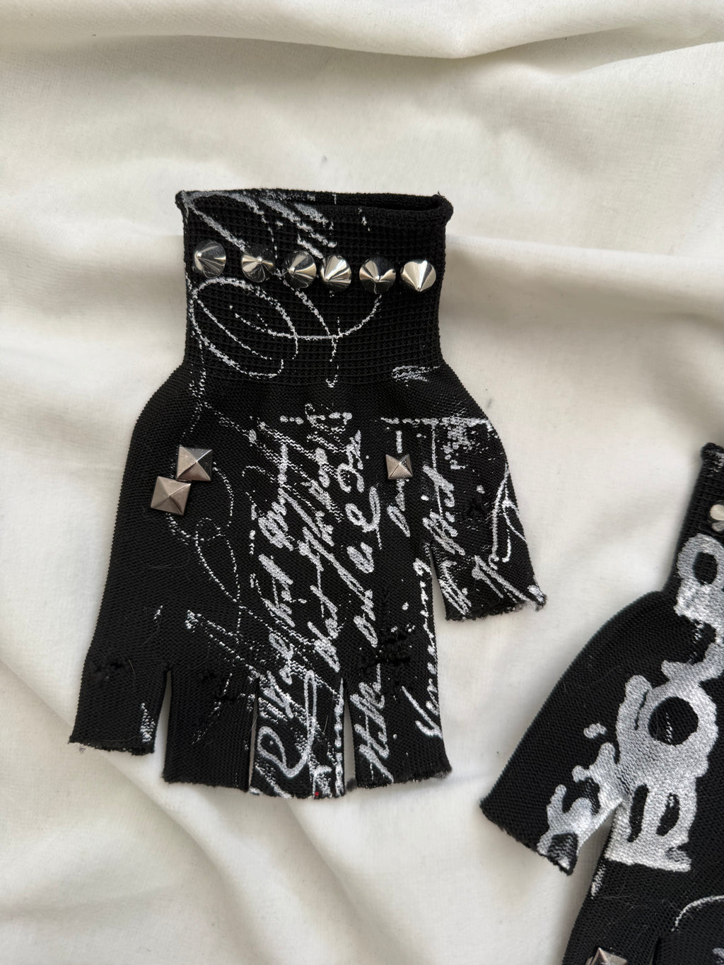 black and white graphic distressed gloves