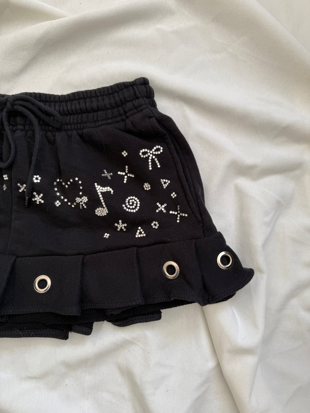 kaomoji rhinestone black pleated mini skirt