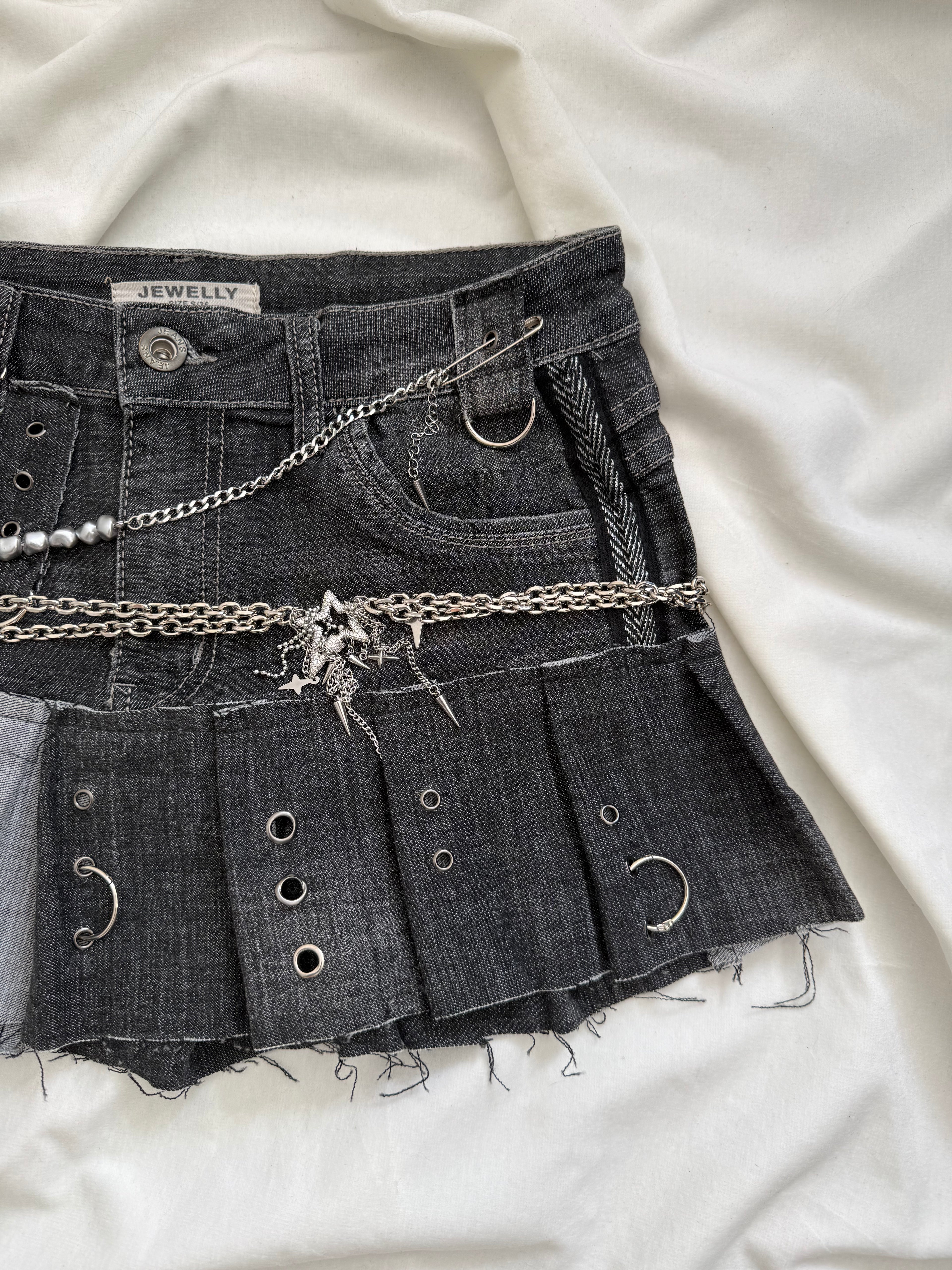irregular pleated dark wash denim mini skirt