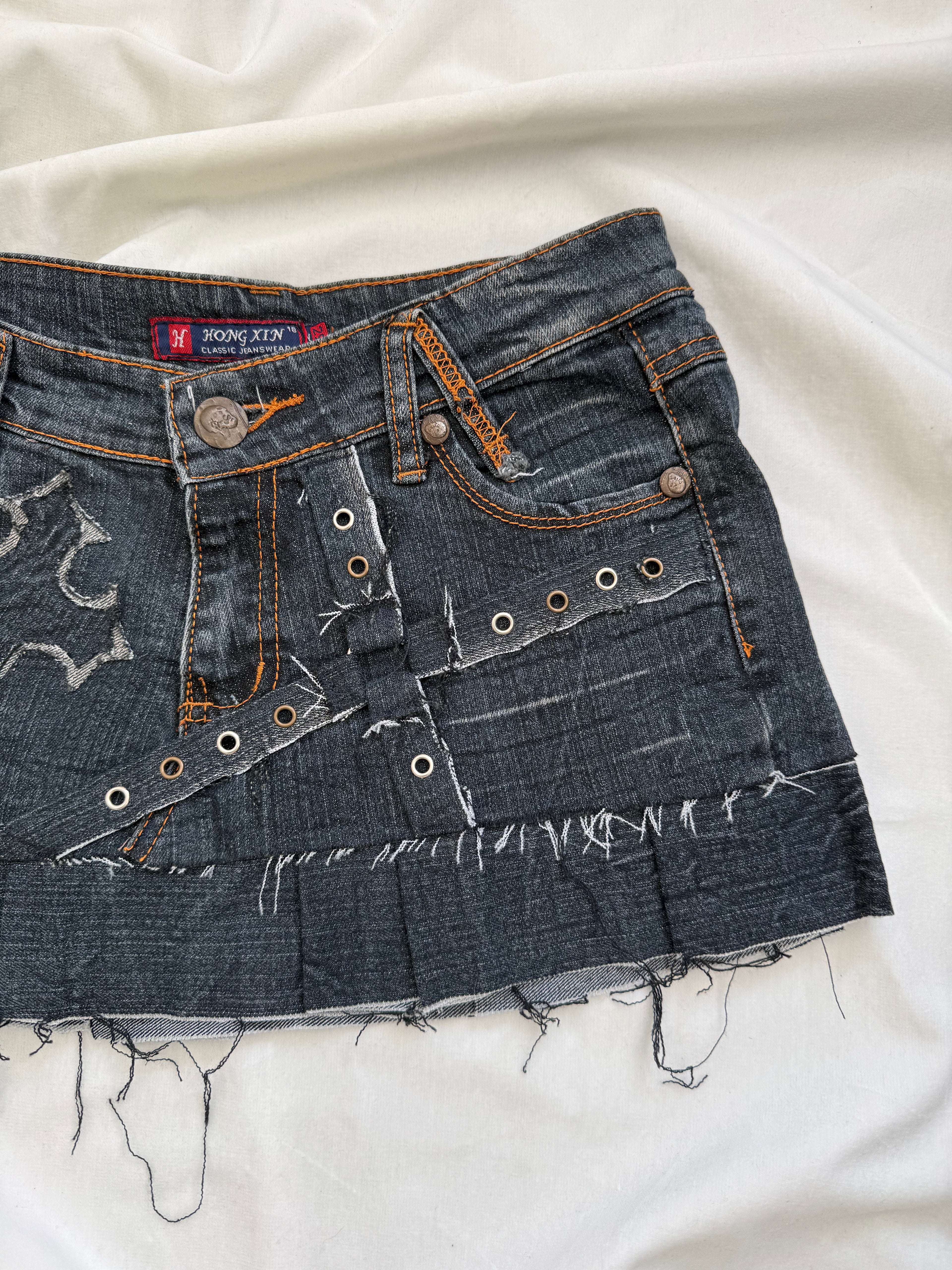 irregular pleated dark wash denim mini skirt