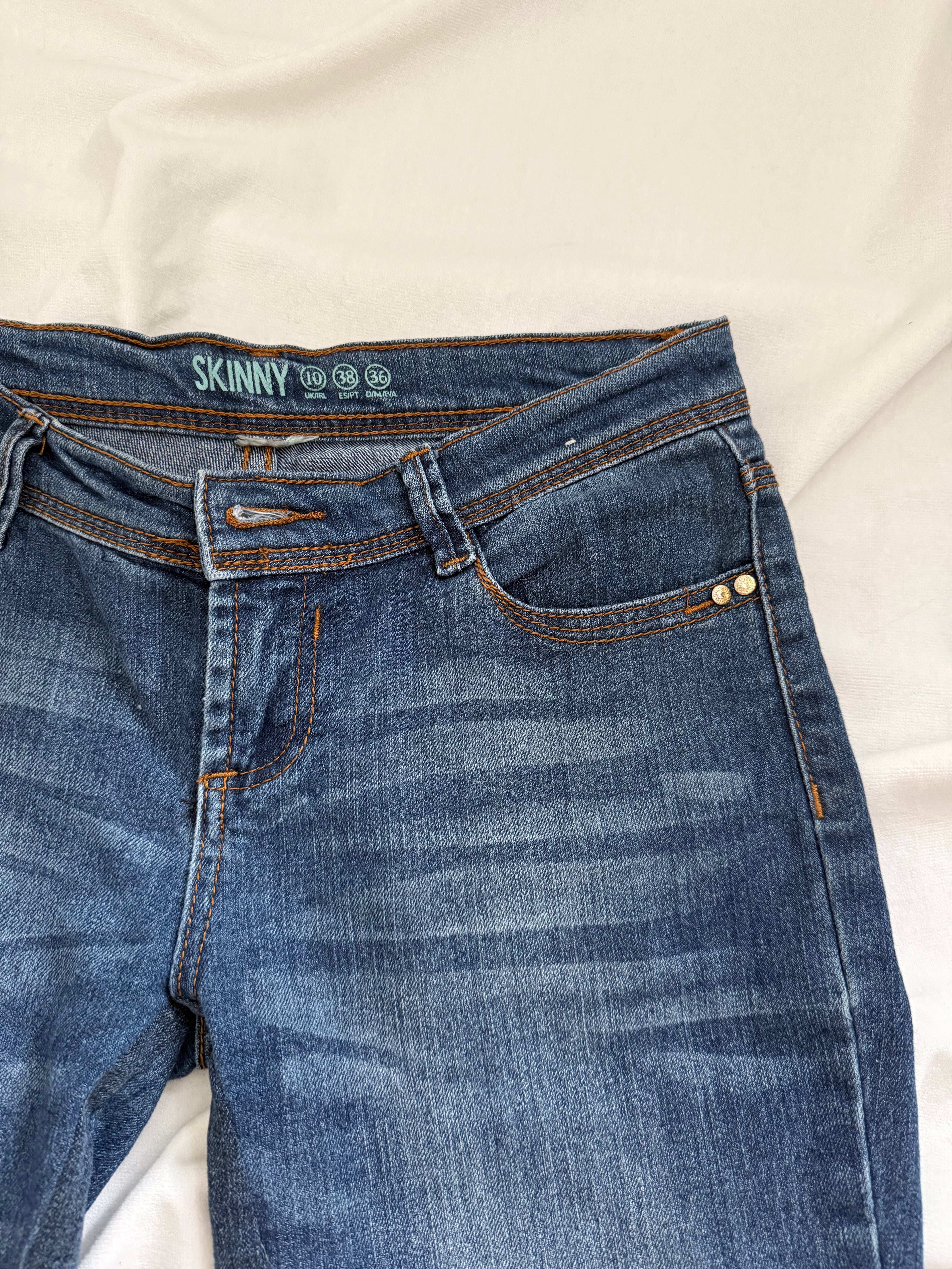blue denim distressed bootcut jeans